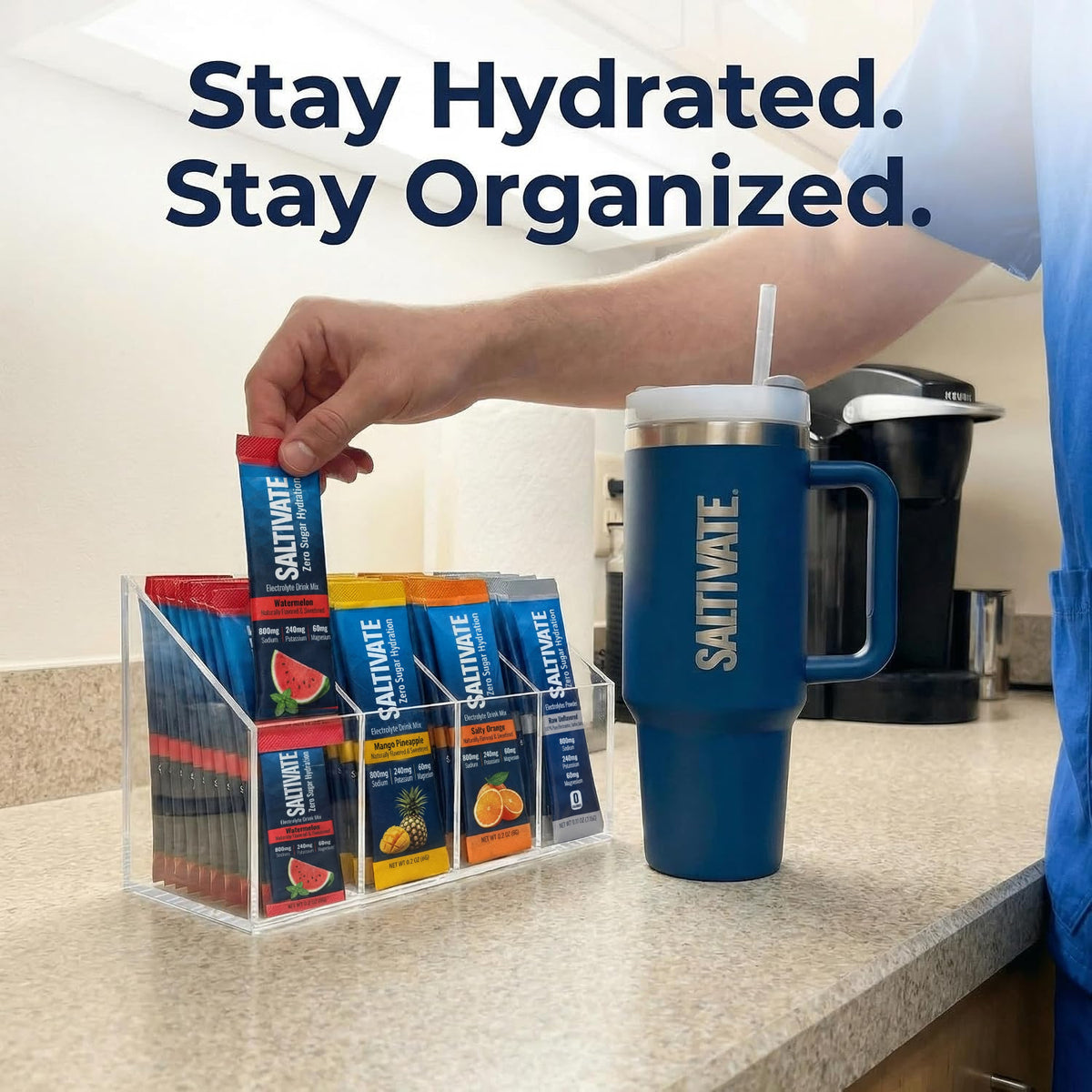 Acrylic organizer with four compartments holding Saltivate electrolyte stick packs