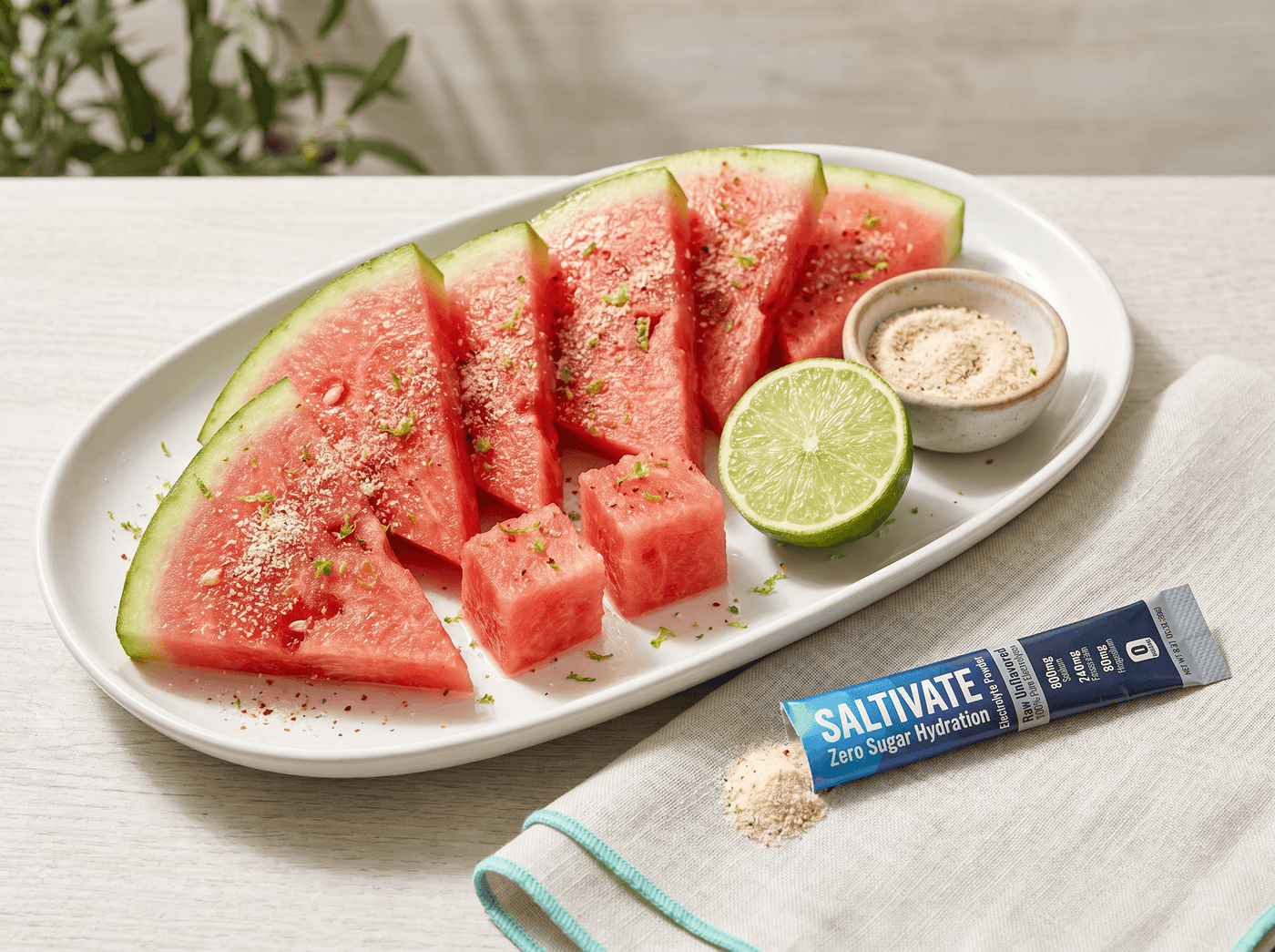 Salted watermelon wedges with chili-lime seasoning and a torn Saltivate stick packet