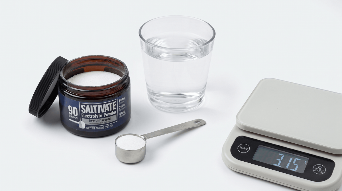Saltivate Raw Unflavored jar with measuring scoop, glass of water, and gram scale