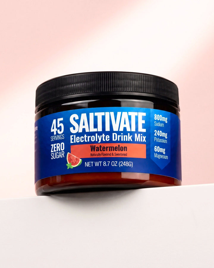 Saltivate Watermelon jar on a white ledge against a pale pink backdrop