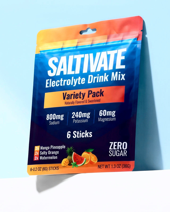 Saltivate Variety Pack 6-stick sampler pouch on a white ledge against a pale sky blue backdrop