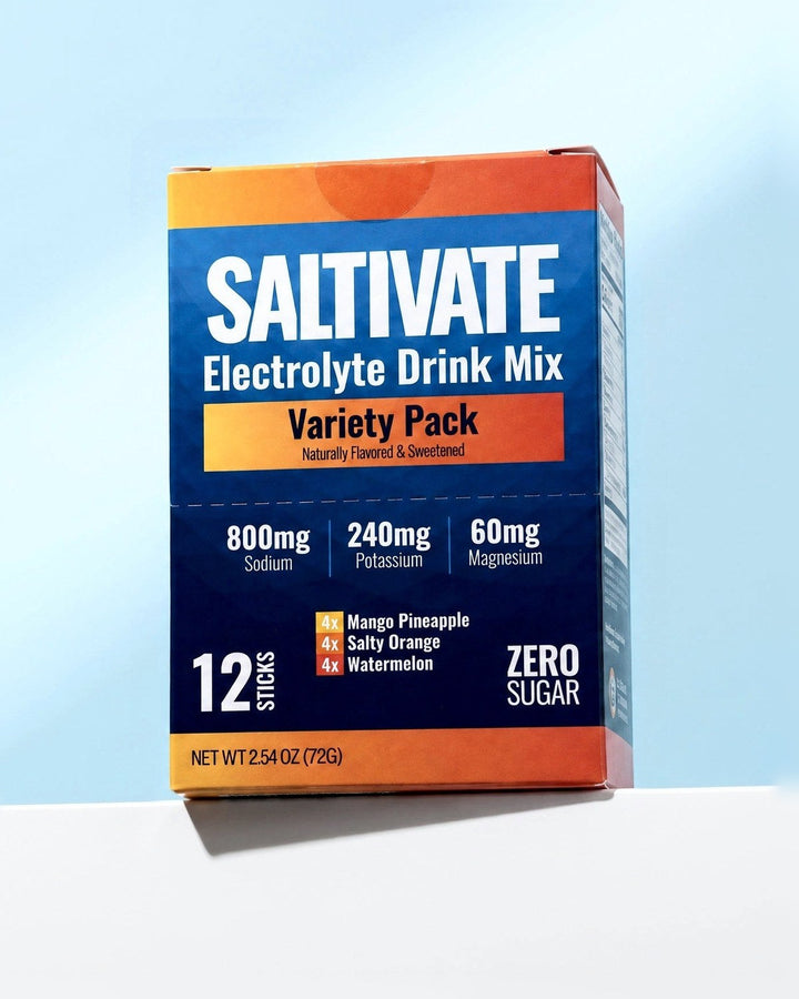 Saltivate Variety Pack 12-stick carton on a white ledge against a pale sky blue backdrop
