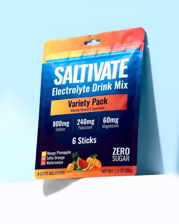 Saltivate Variety Pack 6-stick sampler pouch on a white ledge against a pale sky blue backdrop
